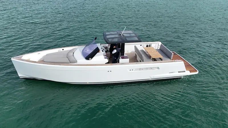 Aerial view of the Fjord 40 on turquoise water